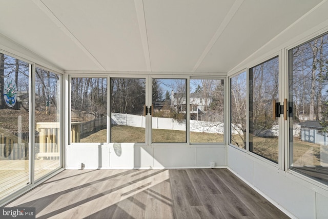 unfurnished sunroom with a wealth of natural light