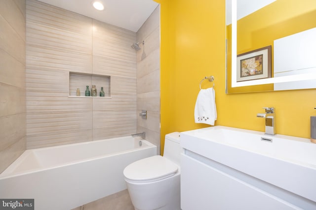 bathroom with  shower combination, vanity, and toilet