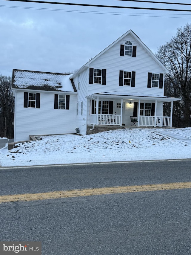 view of front of home featuring covered porch