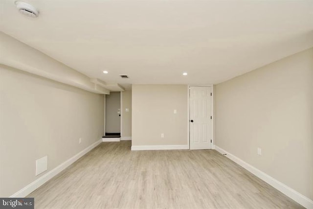 basement with light wood-type flooring