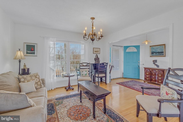 3 Ingram Bay Dr, Heathsville, VA 22473 - living area featuring a notable chandelier and wood finished floors