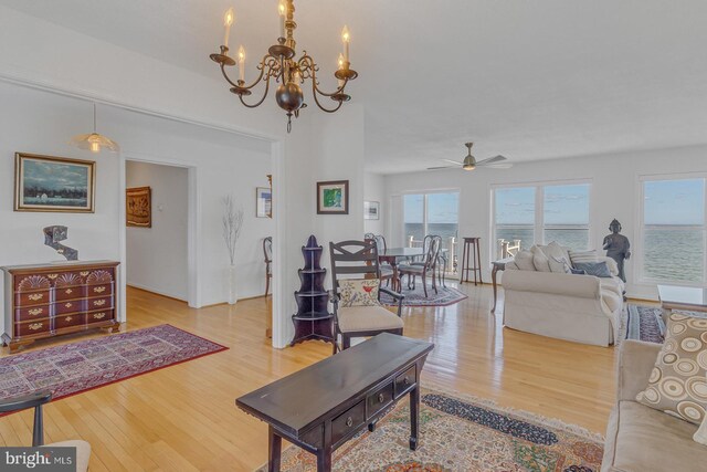 3 Ingram Bay Dr, Heathsville, VA 22473 - living area with ceiling fan with notable chandelier and wood finished floors