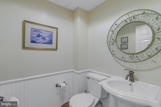 3 Ingram Bay Dr, Heathsville, VA 22473 - half bath with a wainscoted wall, a sink, and toilet