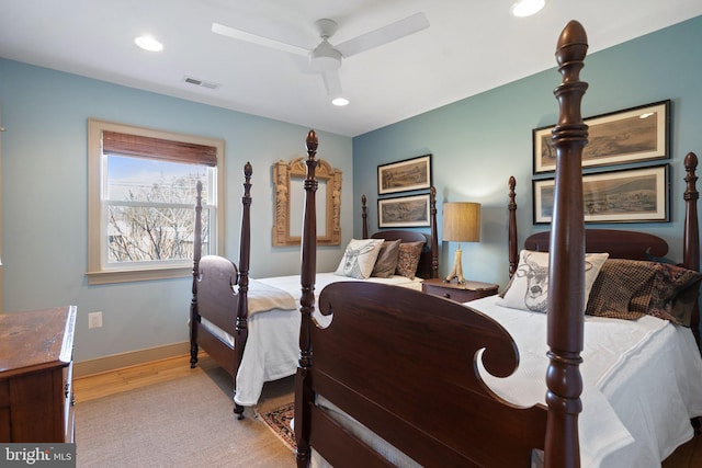 bedroom featuring ceiling fan and light wood-type flooring