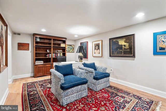 living area featuring light hardwood / wood-style floors