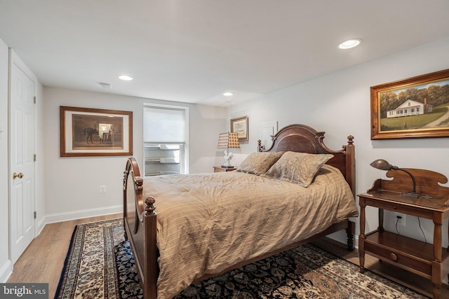 bedroom featuring light hardwood / wood-style floors