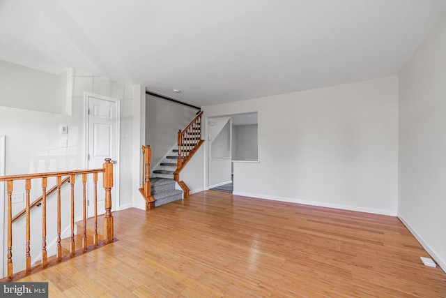 unfurnished room featuring light wood-type flooring