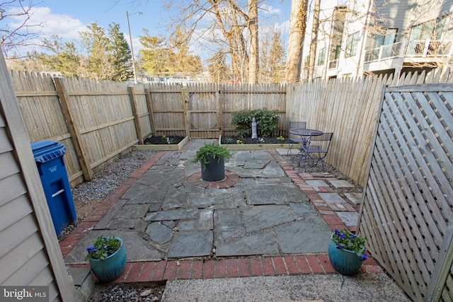 view of patio with a fenced backyard