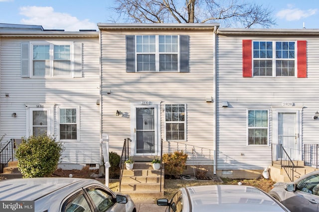 view of front of house featuring crawl space