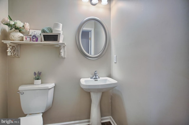 half bathroom with toilet