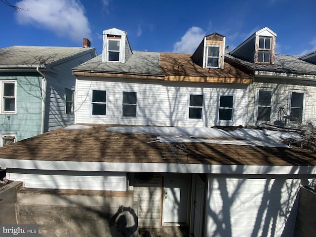 exterior space with a garage