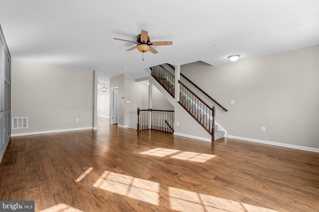 unfurnished living room with hardwood / wood-style flooring and ceiling fan