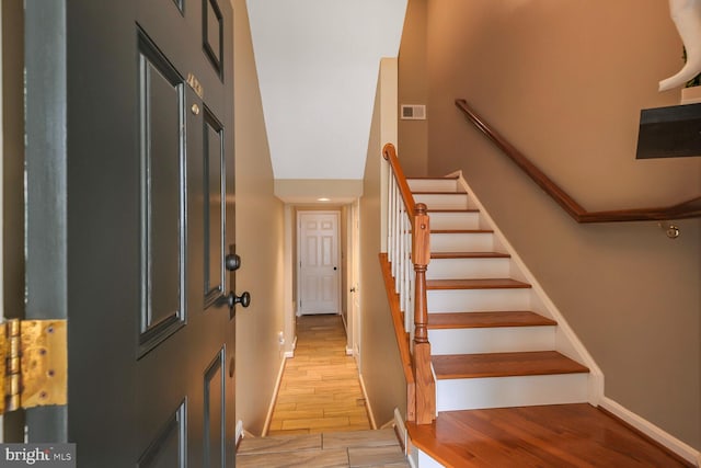 entryway with light hardwood / wood-style flooring