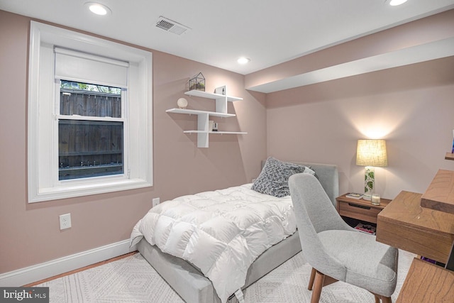 bedroom with recessed lighting, visible vents, and baseboards