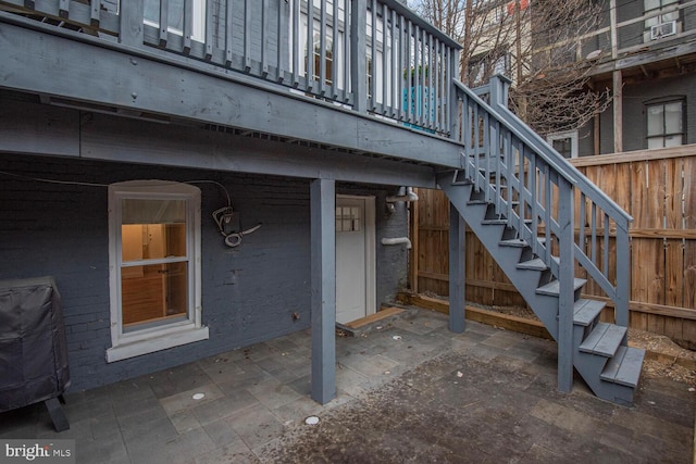 view of patio with stairway