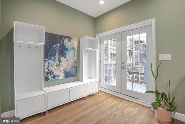 mudroom featuring recessed lighting, french doors, and wood finished floors