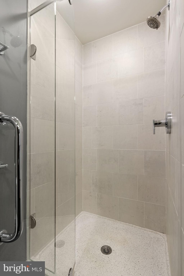 bathroom featuring a stall shower