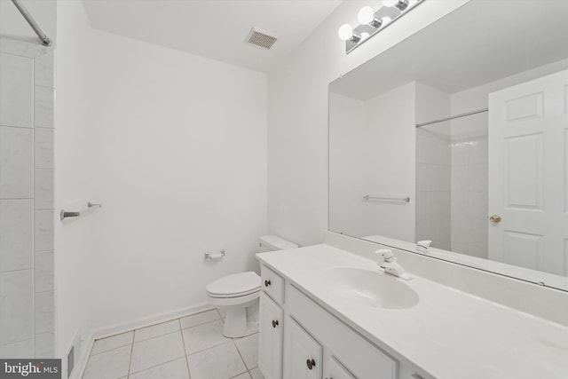 full bath with visible vents, tiled shower, toilet, and tile patterned floors