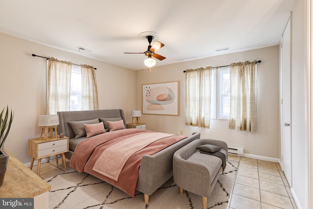 bedroom with baseboard heating, ceiling fan, light tile patterned flooring, and multiple windows