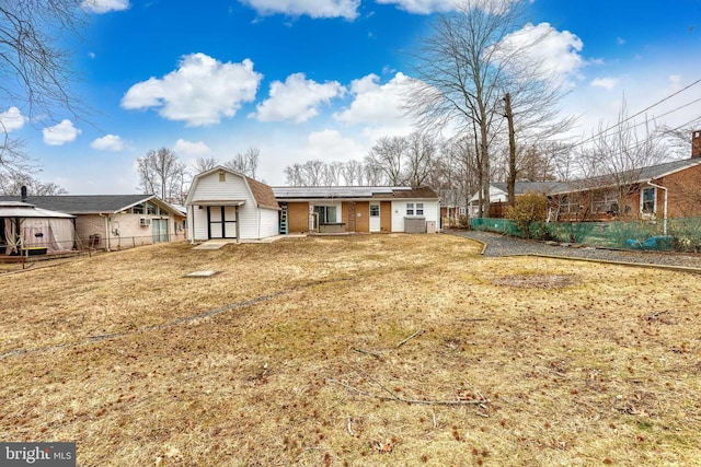 ranch-style house with a front yard