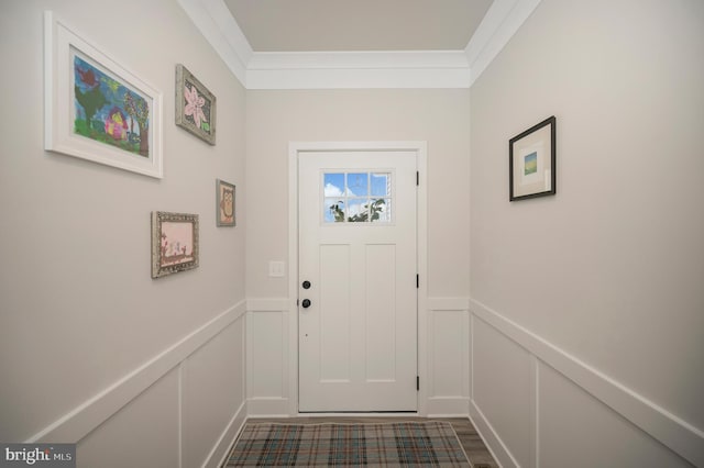 doorway to outside featuring ornamental molding