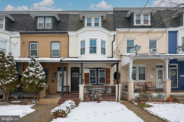 multi unit property featuring a porch