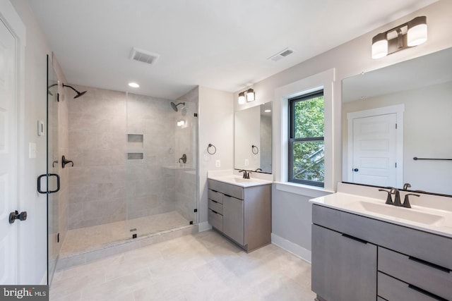 bathroom with vanity and walk in shower