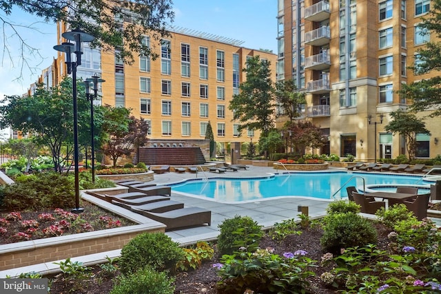 view of pool featuring a patio