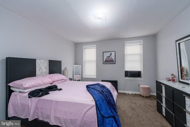 carpeted bedroom featuring multiple windows and cooling unit