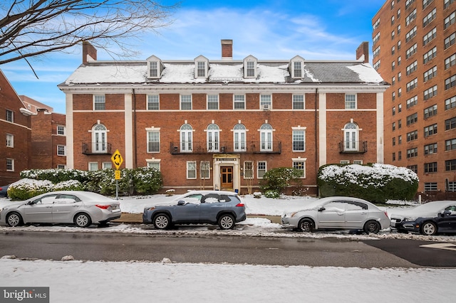 view of snow covered property