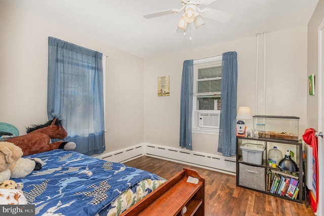 bedroom with ceiling fan, wood finished floors, and cooling unit