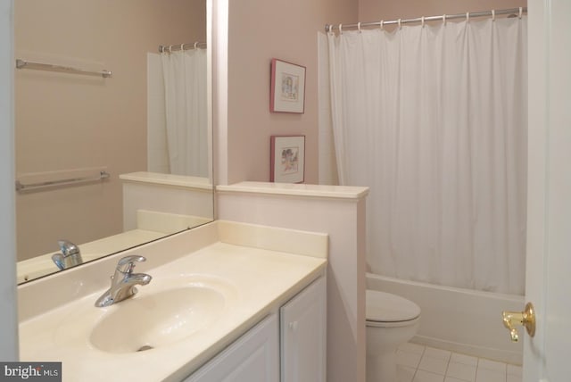 bathroom with toilet, shower / bath combination with curtain, tile patterned flooring, and vanity