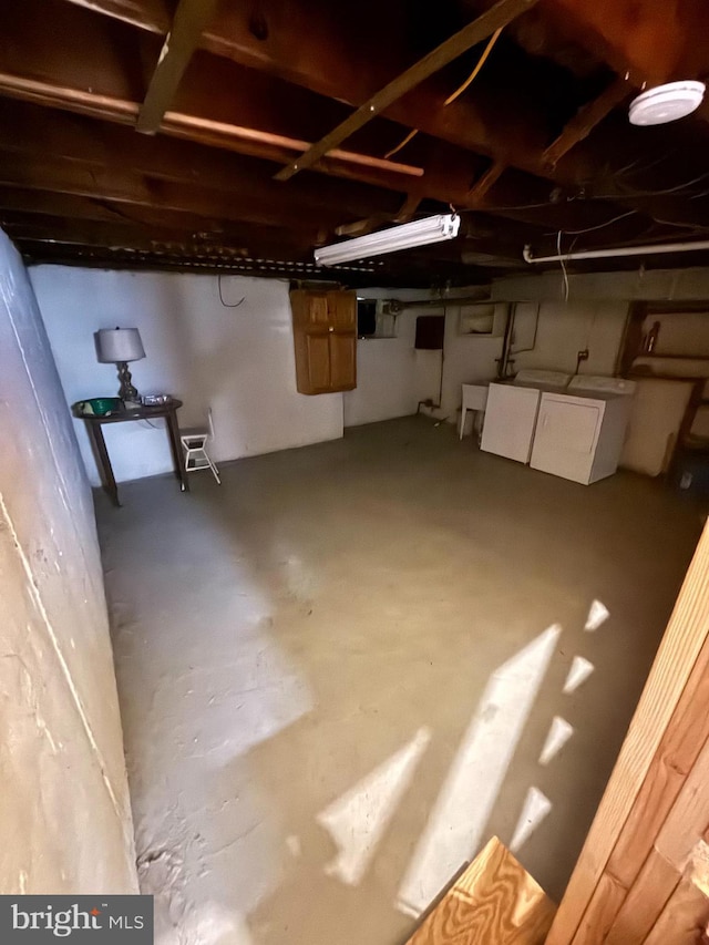 basement featuring washer and dryer