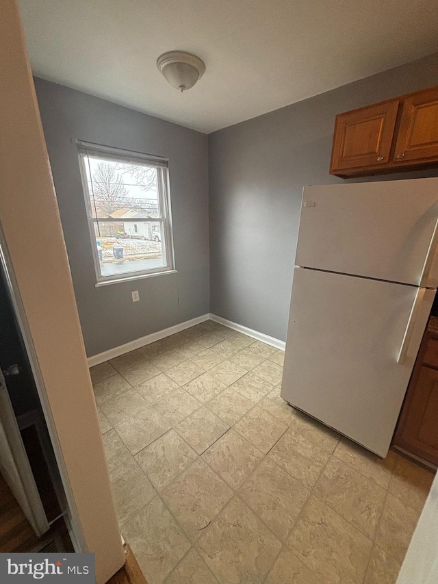 interior space with fridge