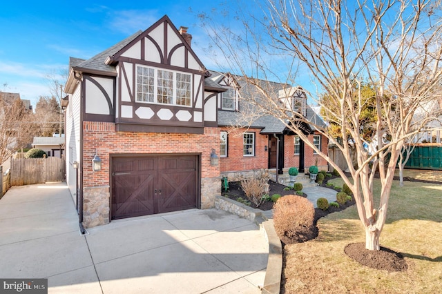 view of front facade featuring a front lawn and a garage