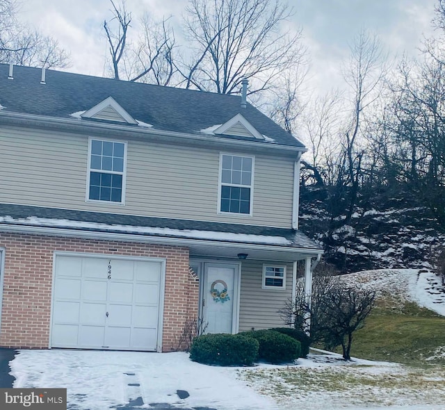 front of property featuring a garage