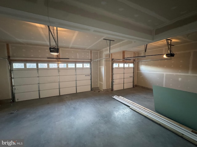 garage featuring a garage door opener