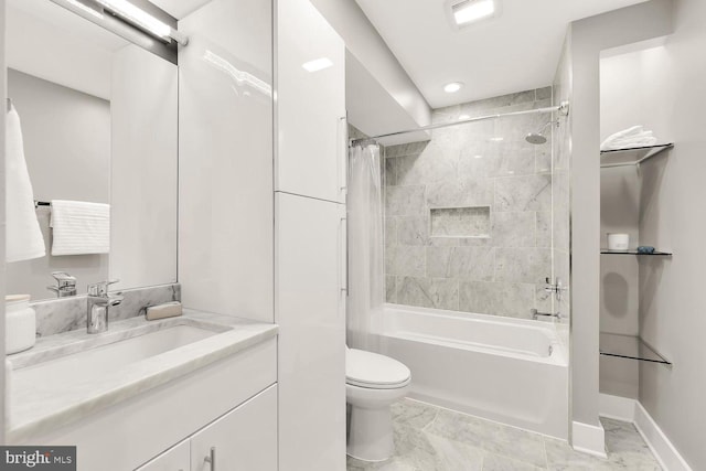 full bathroom featuring vanity, shower / tub combo, and toilet