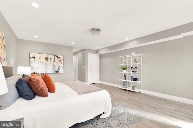 bedroom with light wood-type flooring