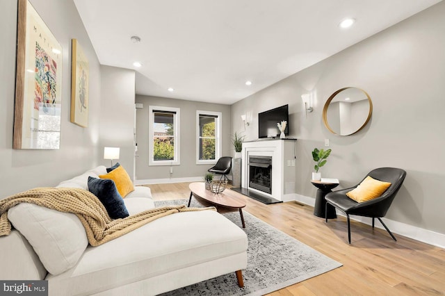 living room with light hardwood / wood-style flooring