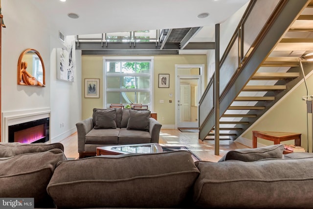 living room with light hardwood / wood-style flooring