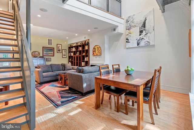 dining room with light hardwood / wood-style floors