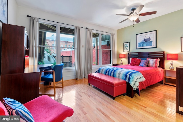 bedroom featuring access to outside and light wood-type flooring