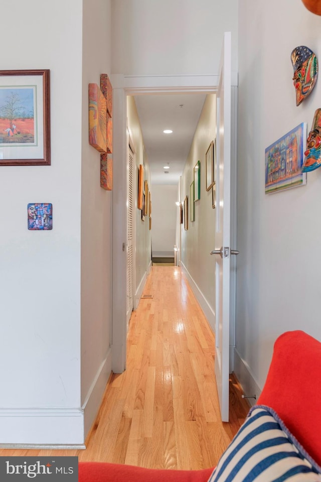 corridor featuring light wood-type flooring