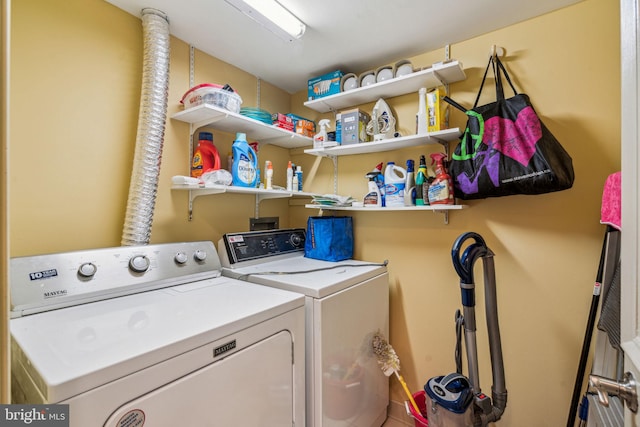 washroom featuring laundry area and independent washer and dryer