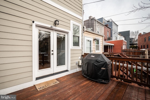 deck featuring french doors and area for grilling