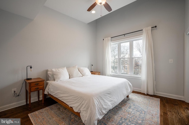 bedroom featuring dark hardwood / wood-style floors and ceiling fan