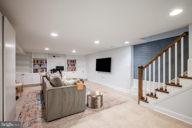 living room featuring built in shelves