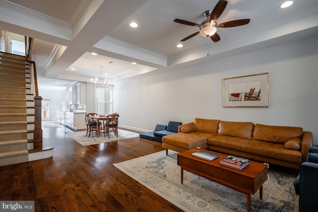 living room with hardwood / wood-style flooring, beam ceiling, crown molding, and coffered ceiling