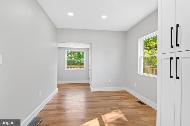 unfurnished bedroom featuring light wood-type flooring